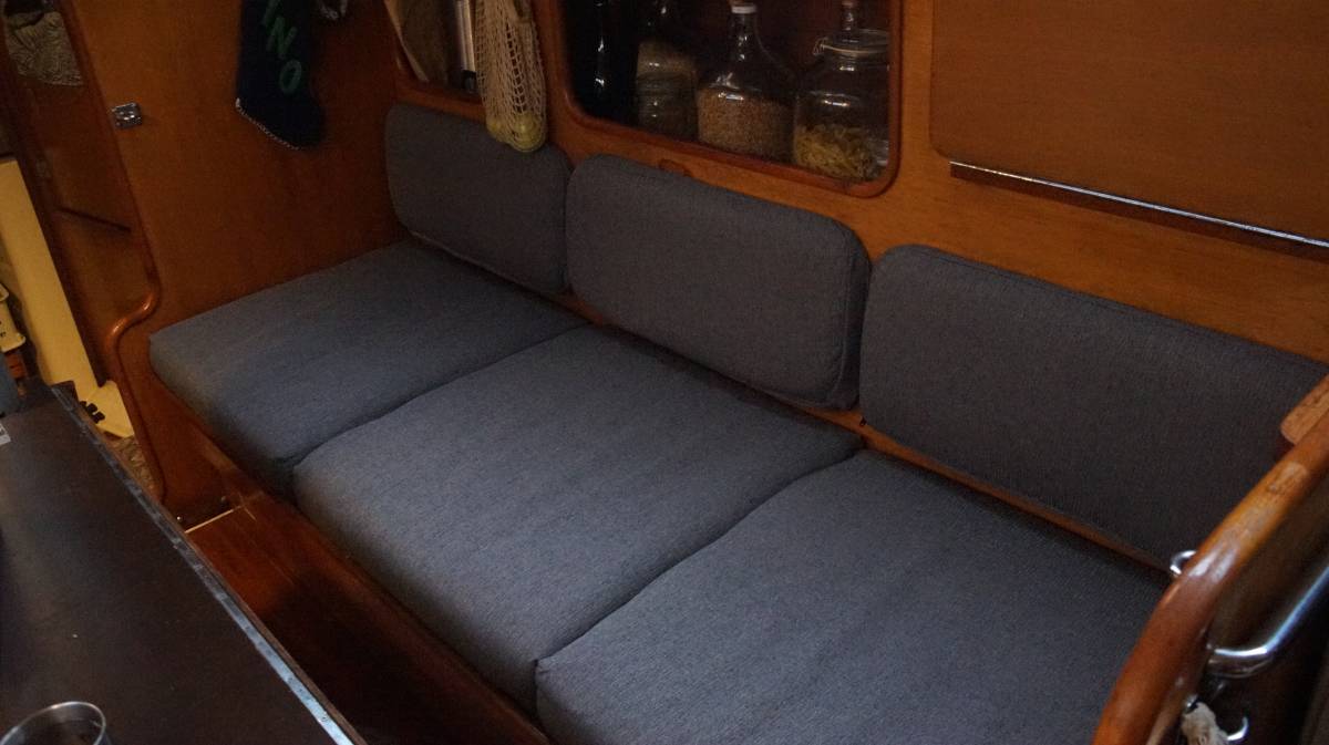 the starboard side settee with all new seat cushions and backrests
