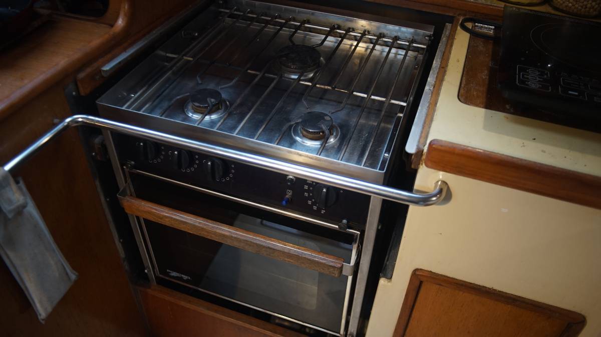 a 3-burner Force 10 LPG oven in a sailboat galley