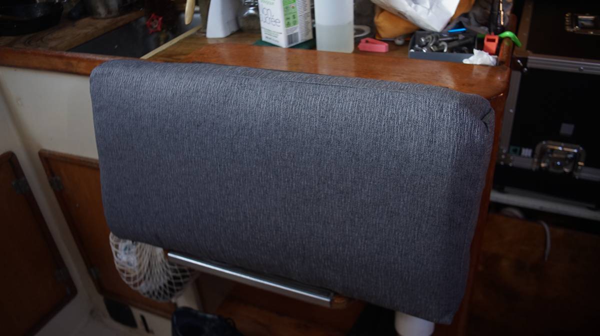 a newly-upholstered rectangular cushion