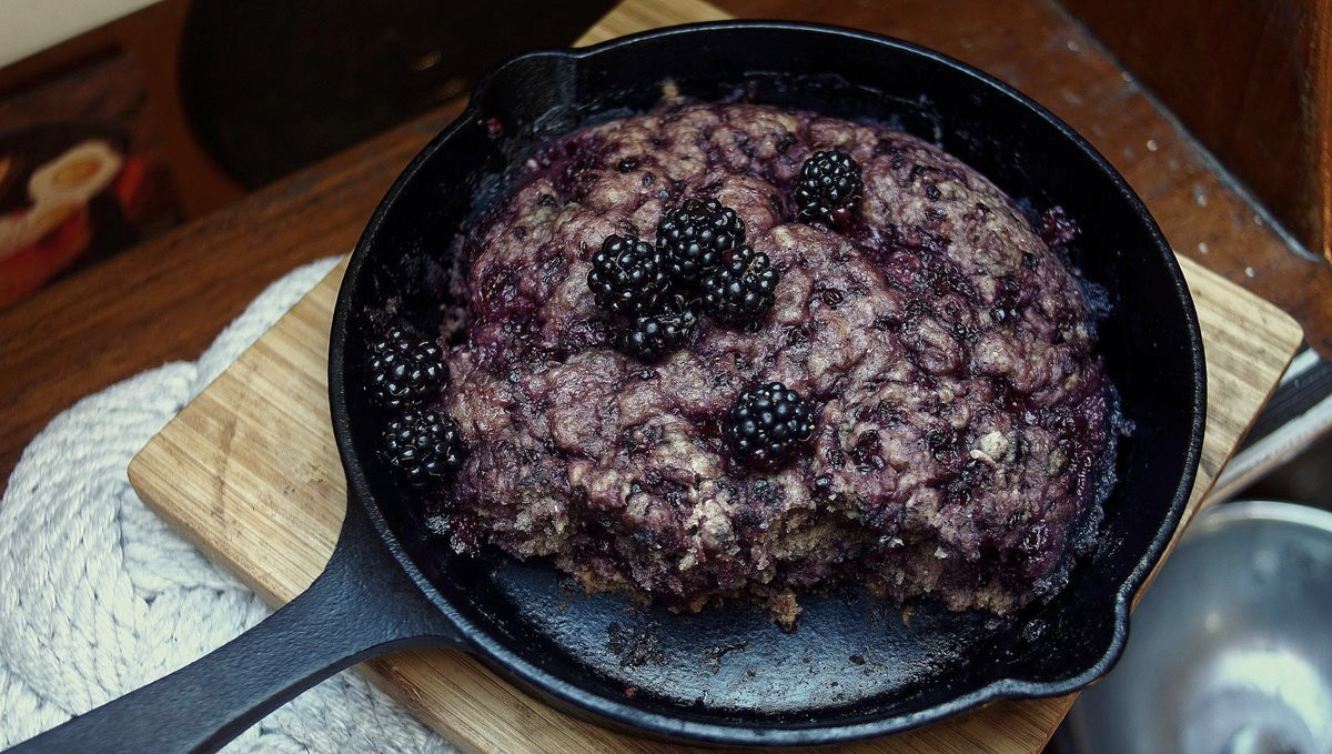 A blackberry cake cooked in a cast-iron pan