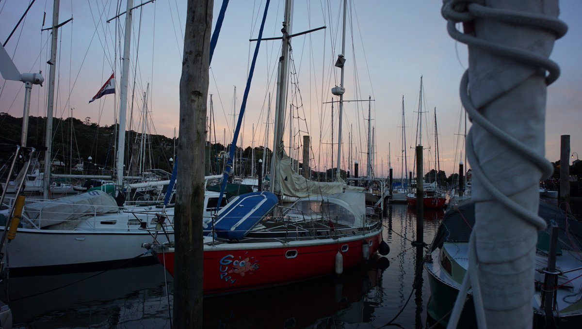a photo of the famous red sailboat guppy, moored opposide of us