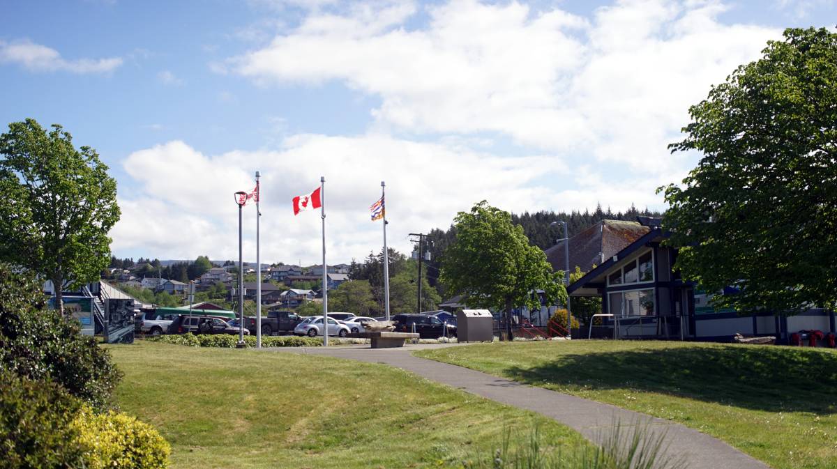 a view of port mcneill when leaving the municipal marina, with the visitor and harbour authority office in view